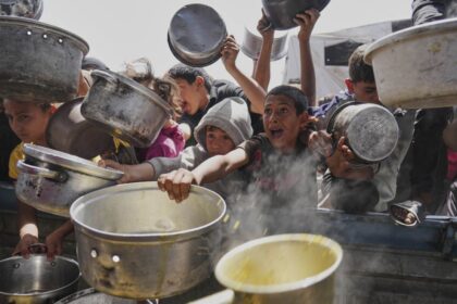Aid groups report surge in looting amid threat of mass starvation in Gaza
