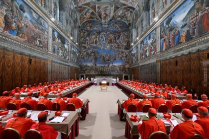 No pope elected on first day of conclave as black smoke appears above Vatican
