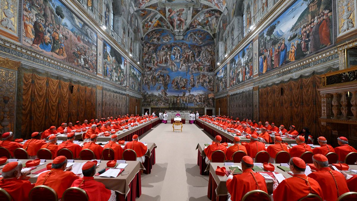No pope elected on first day of conclave as black smoke appears above Vatican