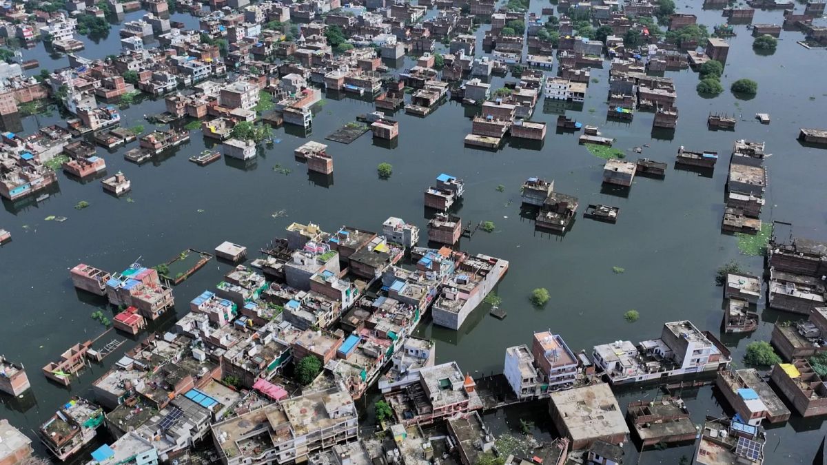 At least four killed and several trapped in flash flooding in northern India, officials say