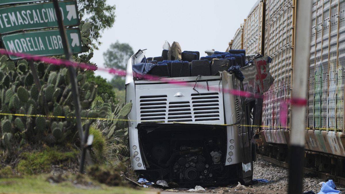 Train-bus collision near Mexican capital leaves 10 dead and 55 injured
