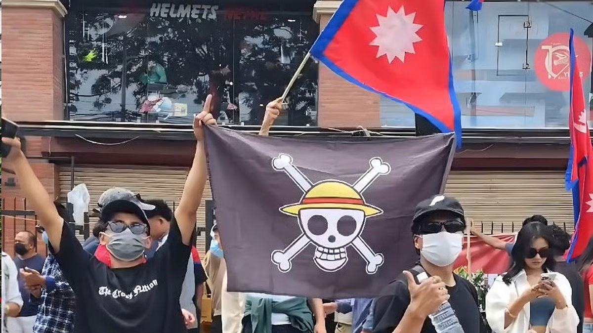 Asian youths fly ‘One Piece’ flag in protest