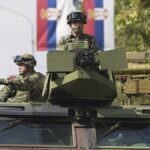 What can the massive military parade in Belgrade reveal about Serbia's foreign policy?