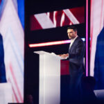 Conservative Giants Spar Under Big Tent at Turning Point USA Conference